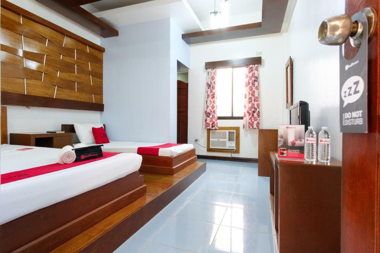 Reddoorz Premium @ Abueg Road Extension Puerto Princesa Bagian luar foto
