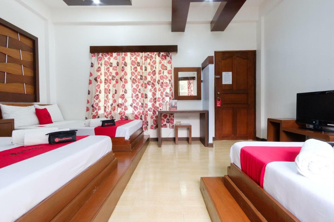 Reddoorz Premium @ Abueg Road Extension Puerto Princesa Bagian luar foto