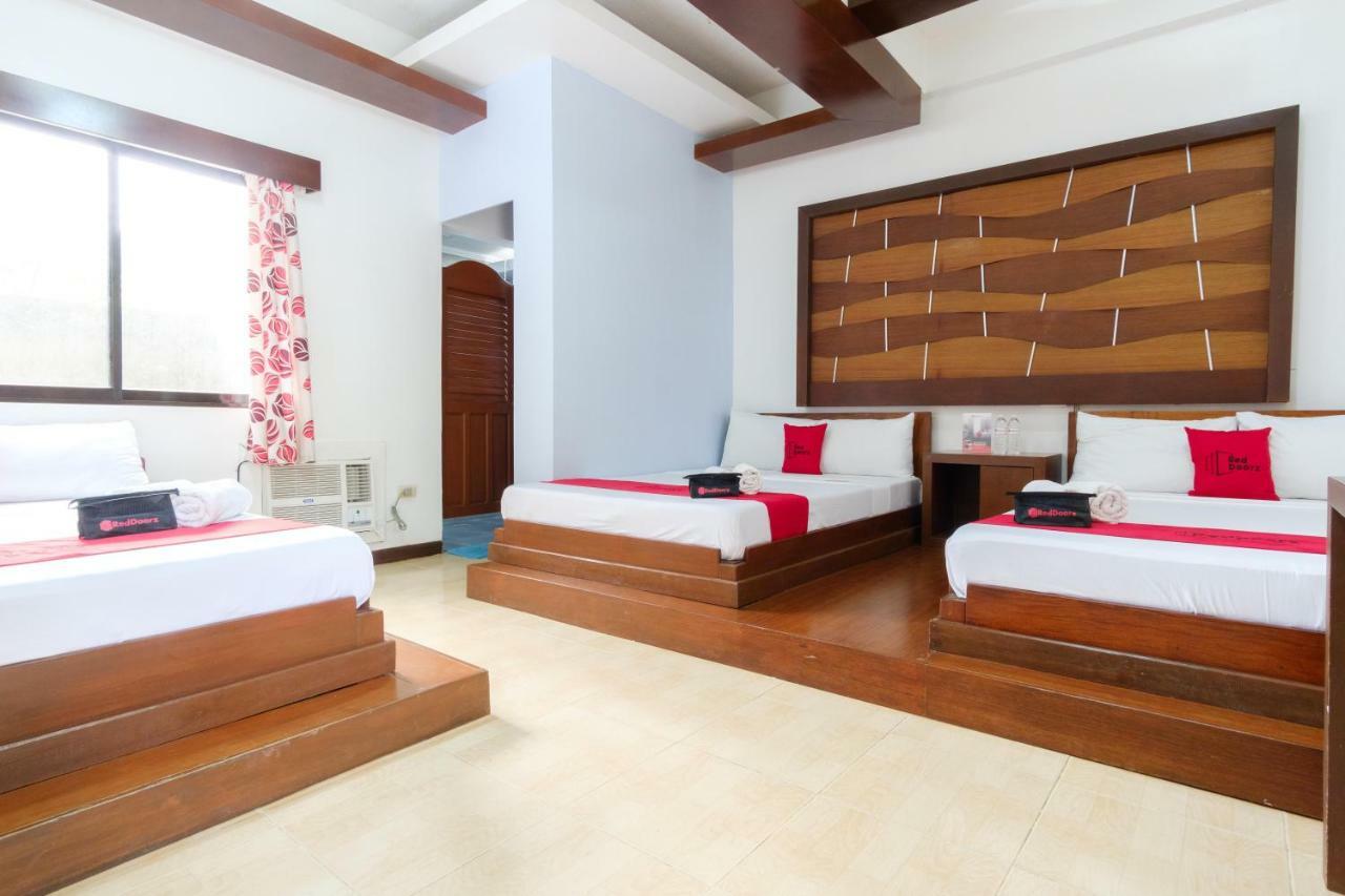 Reddoorz Premium @ Abueg Road Extension Puerto Princesa Bagian luar foto