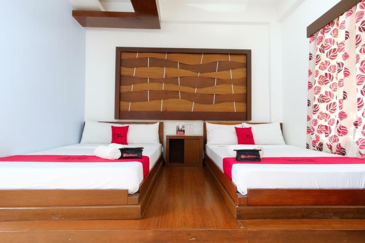 Reddoorz Premium @ Abueg Road Extension Puerto Princesa Bagian luar foto
